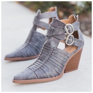 Grey pointed toe caged distressed booties